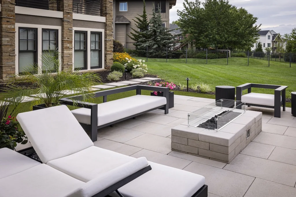 A large scale fire pit seating area.