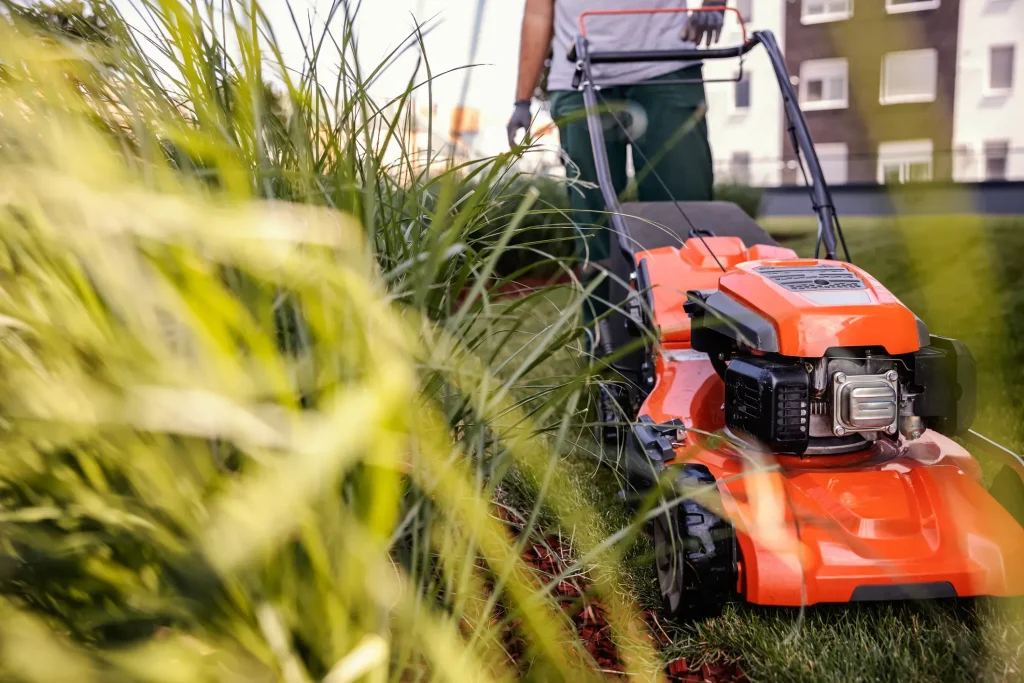 Someone mowing a lawn.